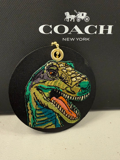 Repurposed Center of a Coach Coaster with Embroidered T-Rex Patch Bag Charm