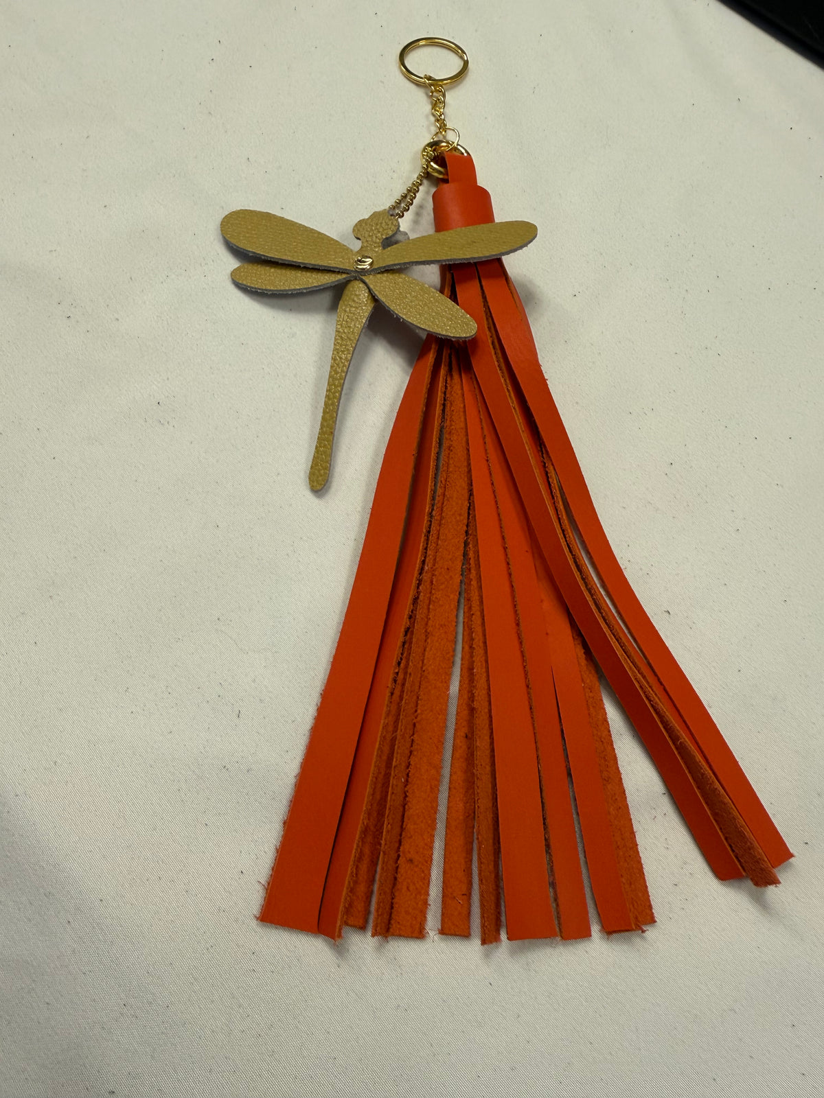 Orange Leather Handcut Tassel with Handmade Yellow Leather Dragonfly Charm on Gold Tone Hardware