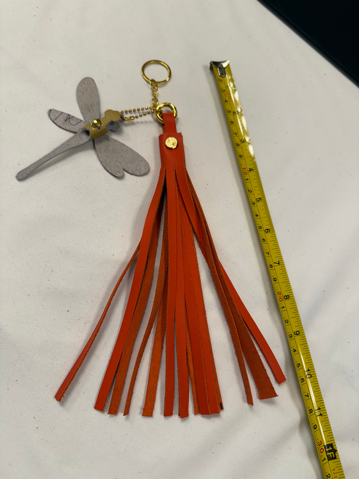 Orange Leather Handcut Tassel with Handmade Yellow Leather Dragonfly Charm on Gold Tone Hardware