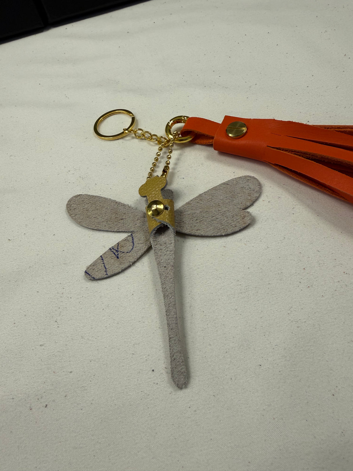 Orange Leather Handcut Tassel with Handmade Yellow Leather Dragonfly Charm on Gold Tone Hardware