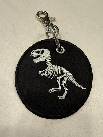 Repurposed Piece of a Coach Handbag with T-Rex Skeleton Patch Bag Charm