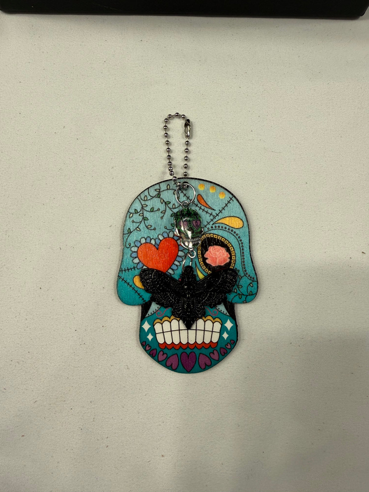 Sugar Skull Embossed on Wood with Sugar Skull and Skull Moth Charm Bag Charm