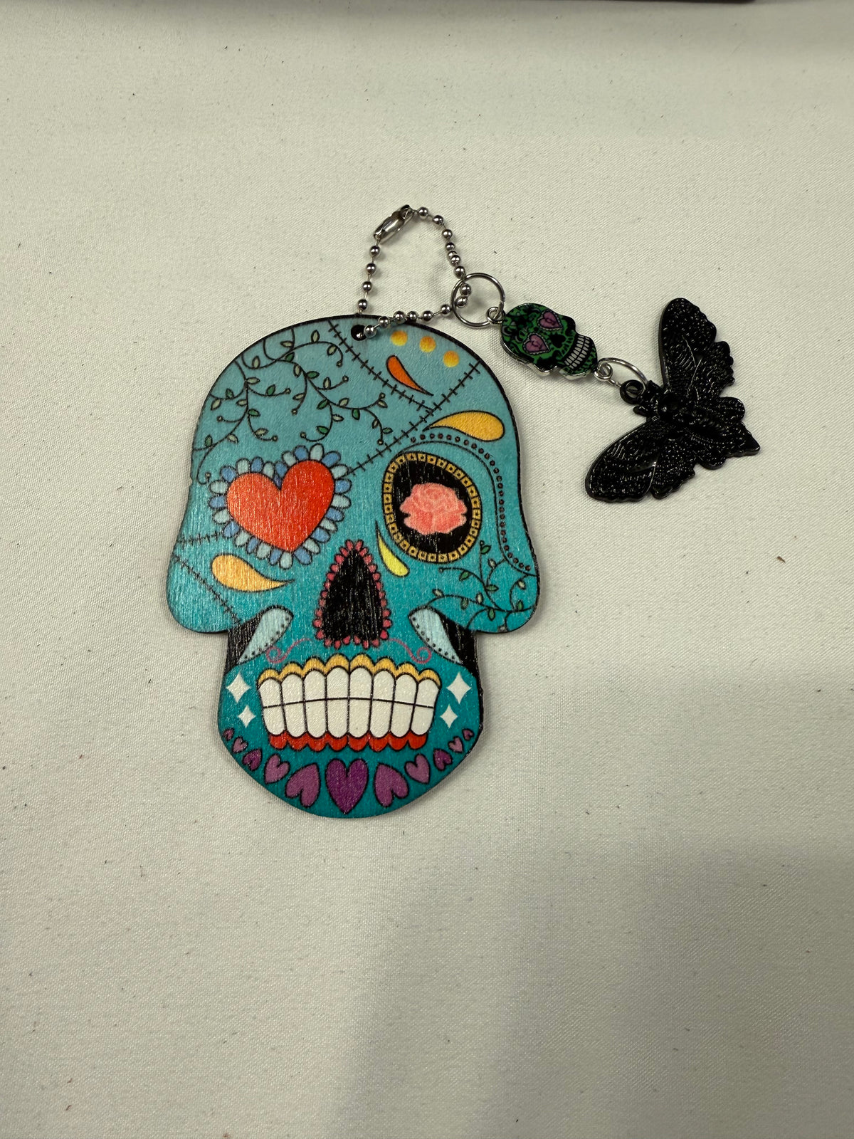Sugar Skull Embossed on Wood with Sugar Skull and Skull Moth Charm Bag Charm
