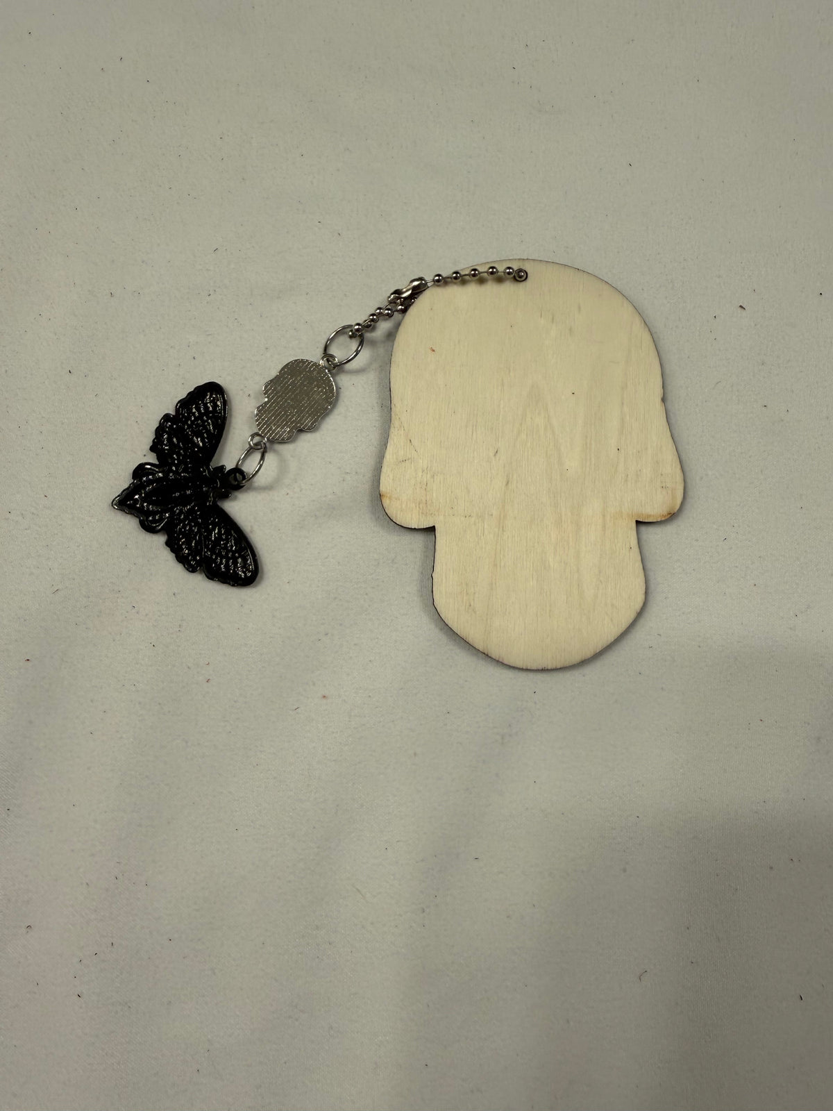 Sugar Skull Embossed on Wood with Sugar Skull and Skull Moth Charm Bag Charm