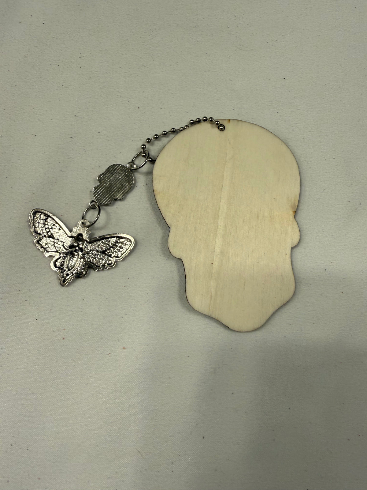 Sugar Skull Embossed on Wood with Sugar Skull and Skull Moth Charm Bag Charm