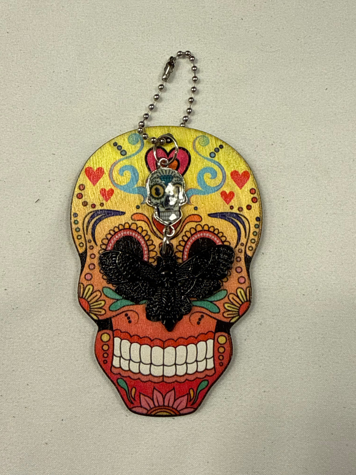 Sugar Skull Embossed on Wood with Sugar Skull and Skull Moth Charm Bag Charm