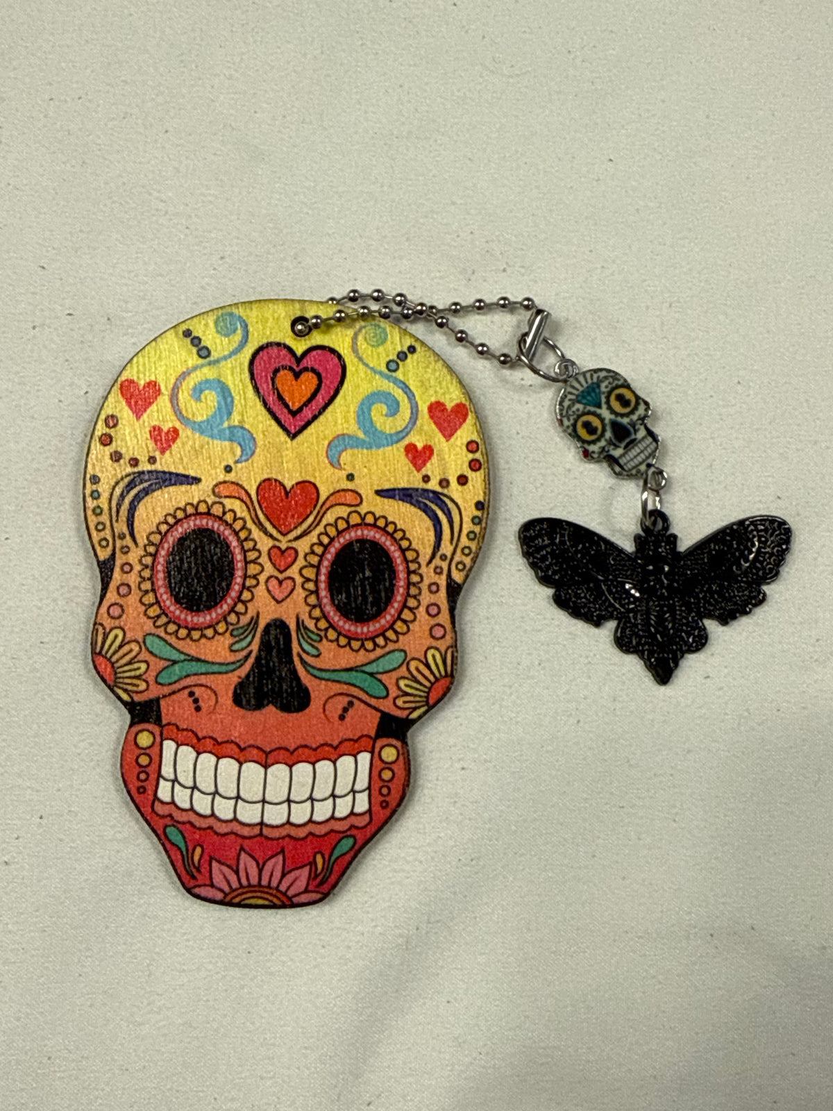 Sugar Skull Embossed on Wood with Sugar Skull and Skull Moth Charm Bag Charm