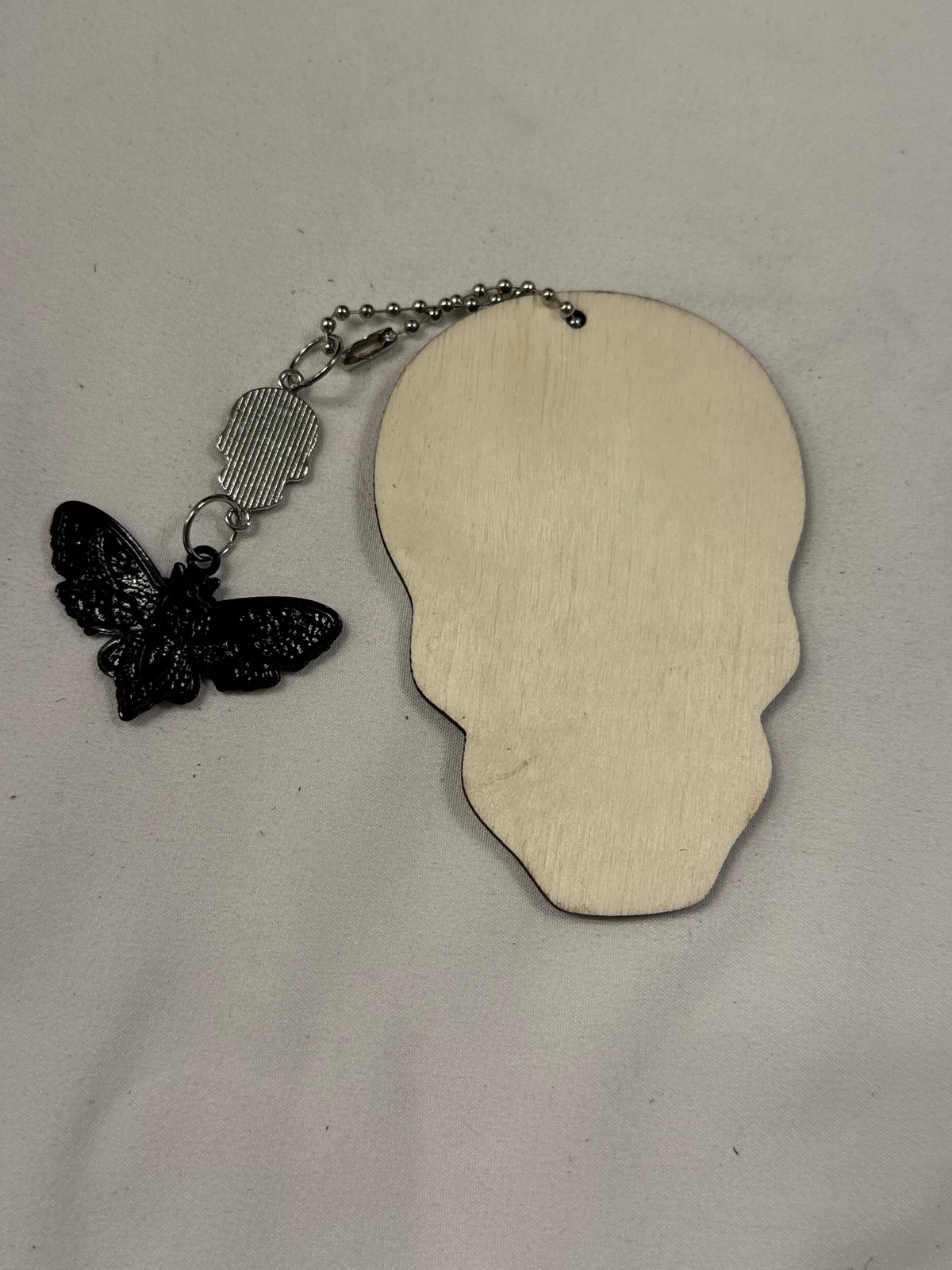 Sugar Skull Embossed on Wood with Sugar Skull and Skull Moth Charm Bag Charm