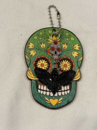 Green Sugar Skull Embossed on Wood with a Sugar Skull and Skull Moth Charm Bag Charm