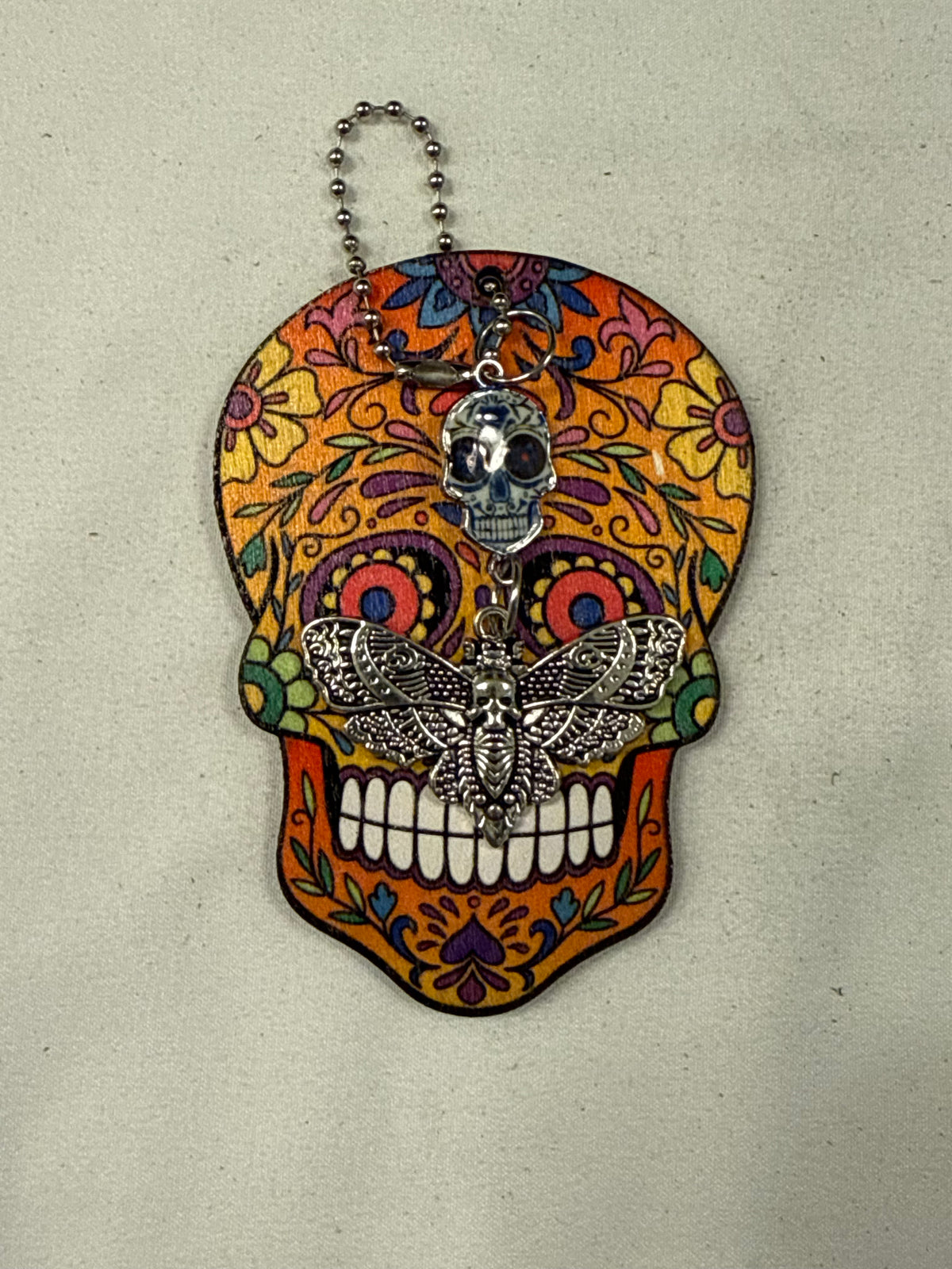 Sugar Skull Embossed on Wood with Sugar Skull and Skull Moth Charm Bag Charm