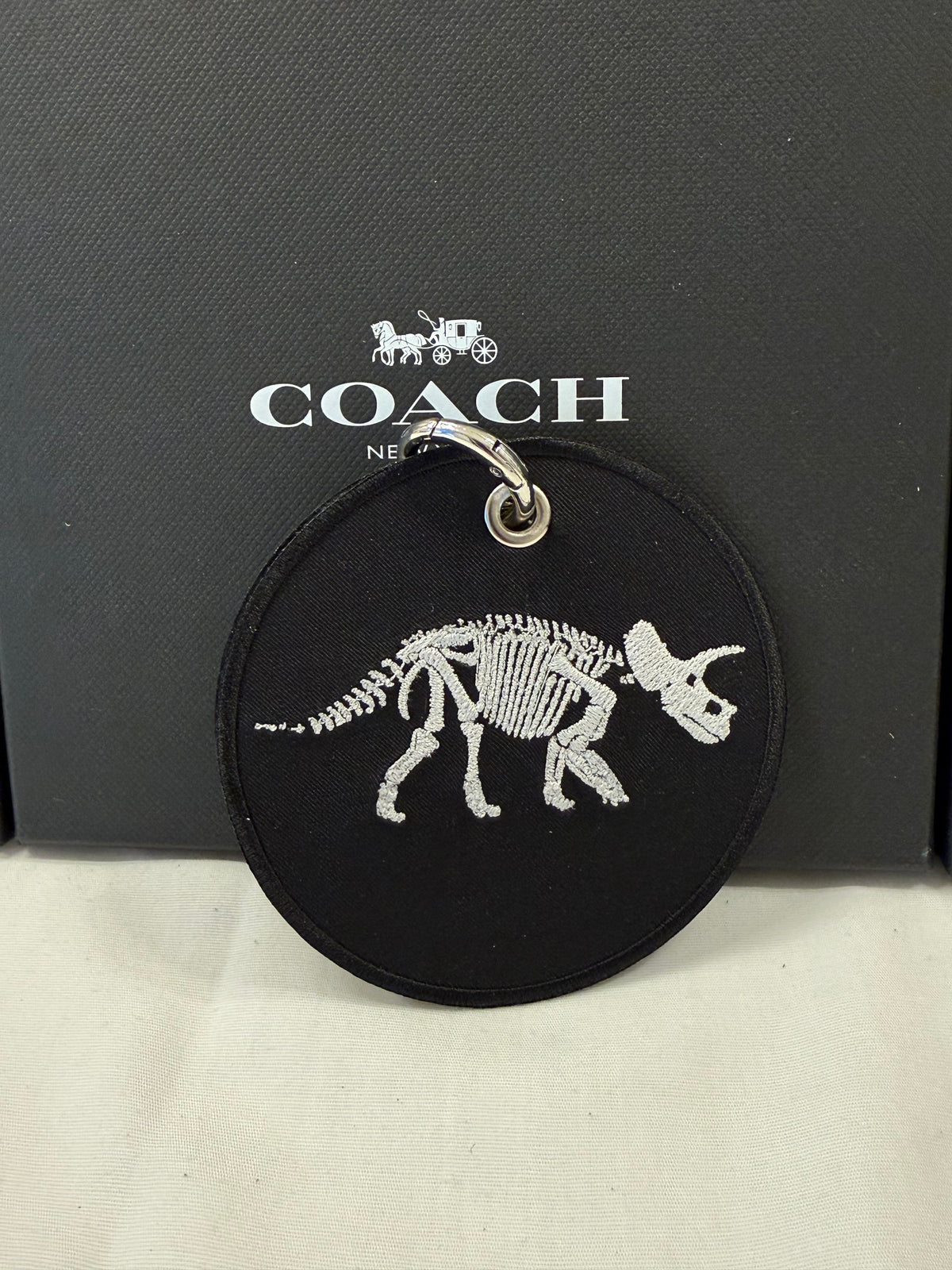 Dinosaur Skeleton Patch on a Piece of Repurposed Coach Handbag Bag Charm