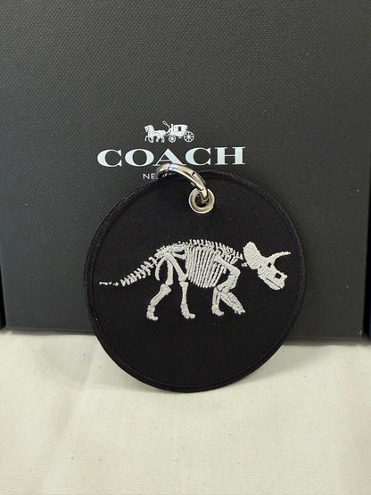 Dinosaur Skeleton Patch on a Piece of Repurposed Coach Handbag Bag Charm