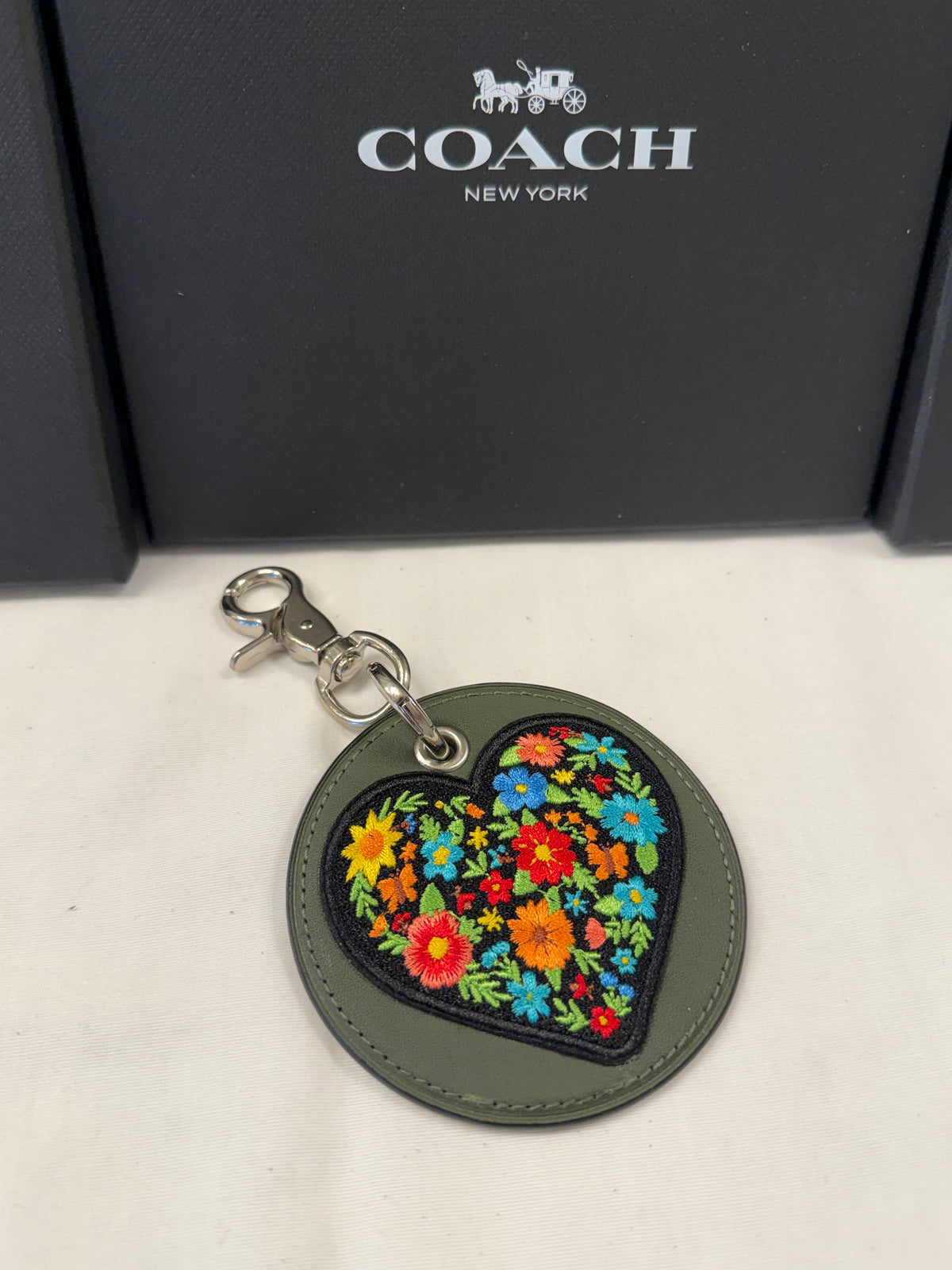 Repurposed Olive Coach Coaster with an Embroidered Heart Patch Bag Charm