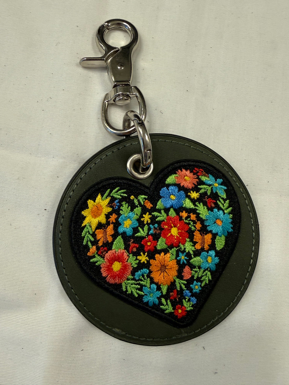 Repurposed Olive Coach Coaster with an Embroidered Heart Patch Bag Charm
