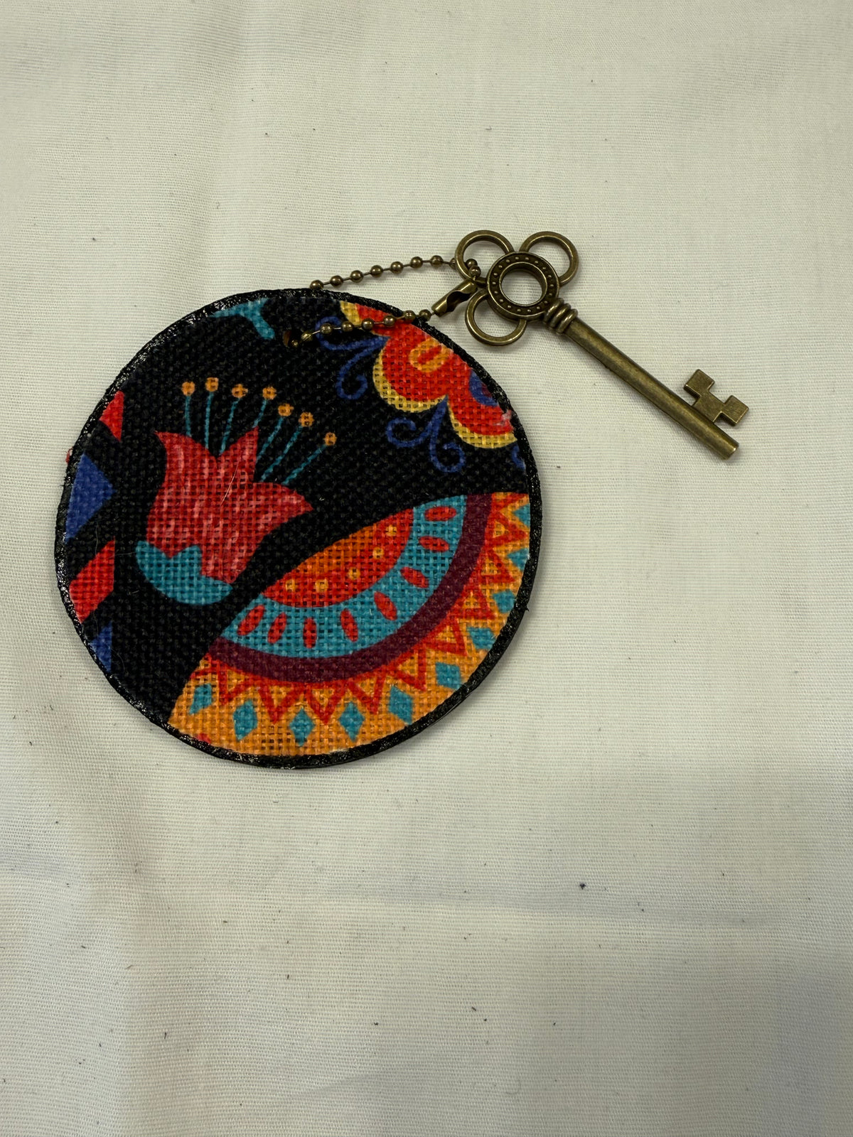 Dia De Los Muertos Textile on a Painted Leather Disc with Charm