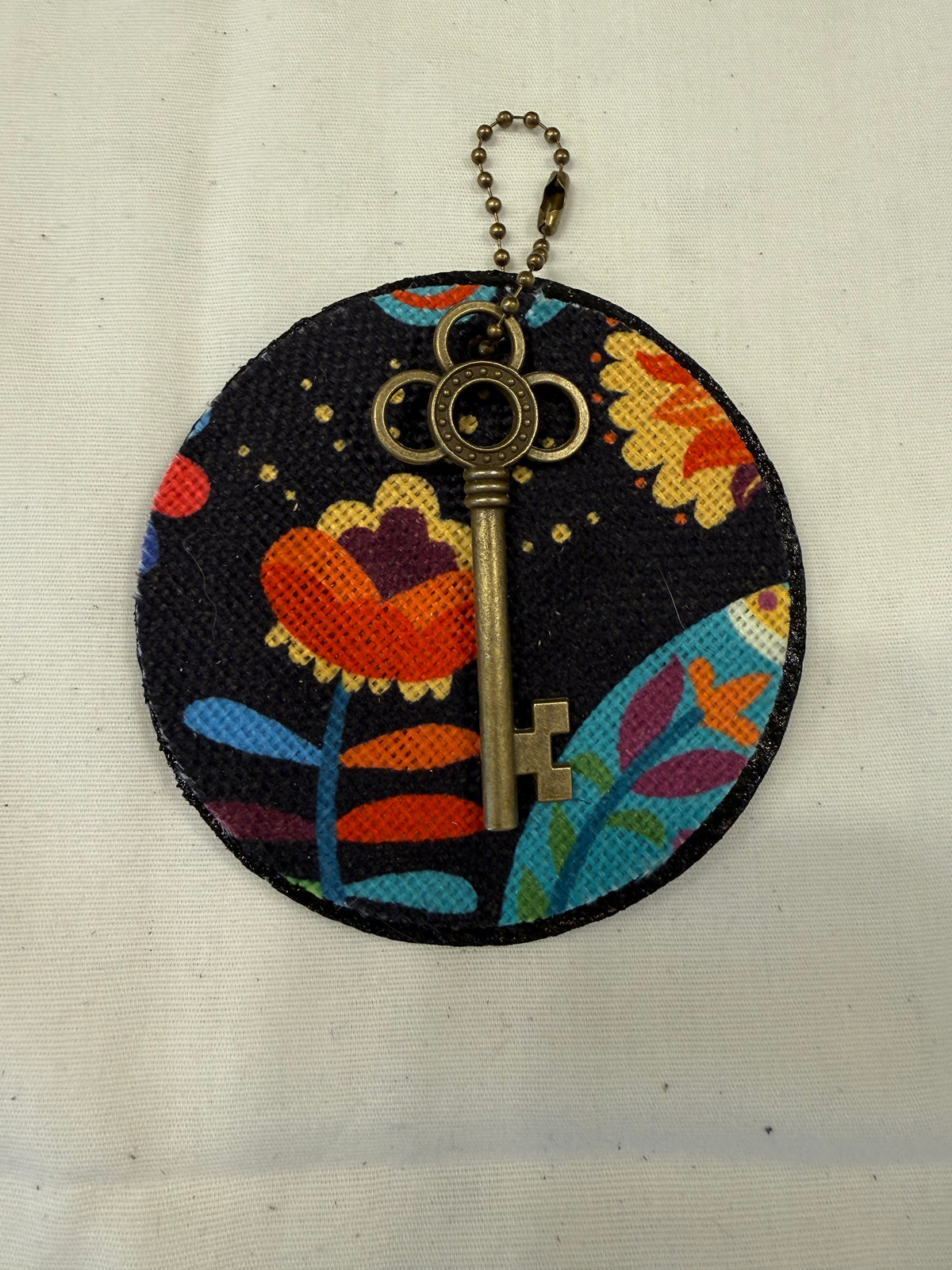 Dia De Los Muertos Textile on a Painted Leather Disc with Charm
