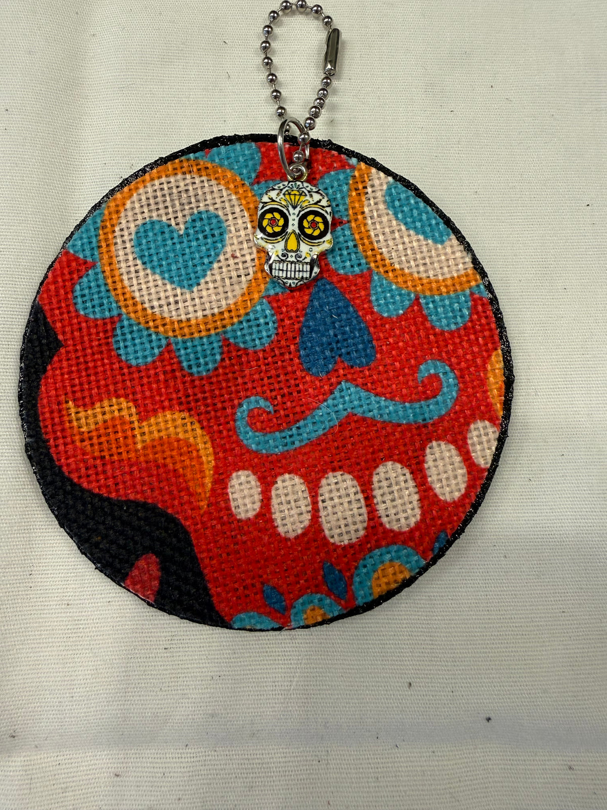 Sugar Skull Textile on a Painted Leather Disc with Charm