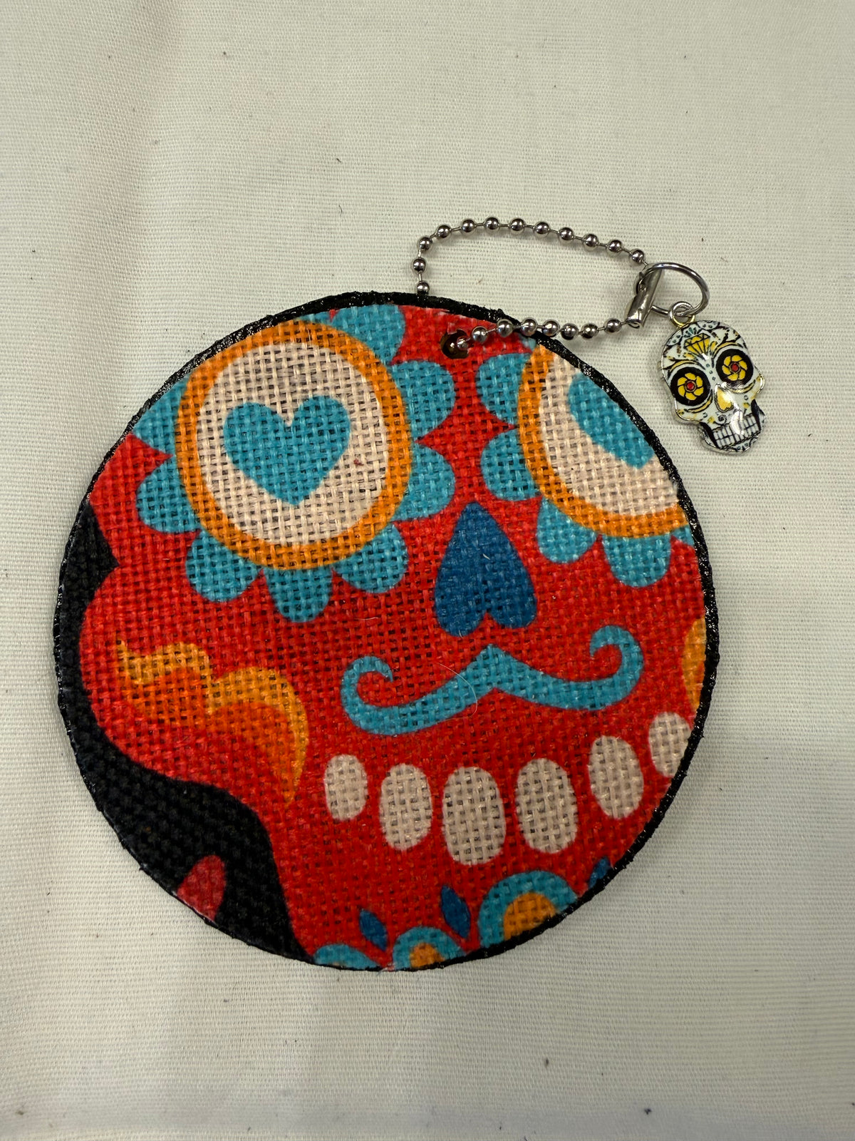 Sugar Skull Textile on a Painted Leather Disc with Charm