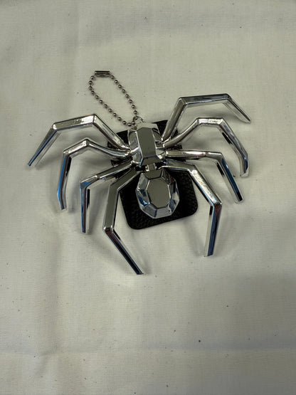 Metallic Plastic Spider on a Piece of a Coach Lora Bucket Bag Hangtag Style Charm