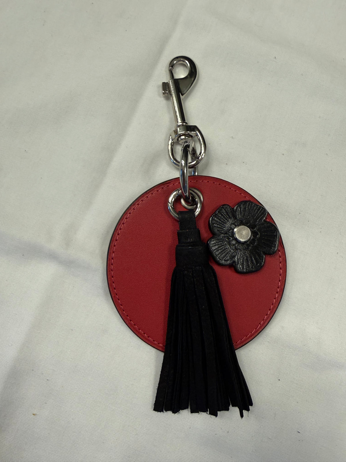 Repurposed Coach Coaster, Coach Tassel, and Coach Tea Rose Bag Charm