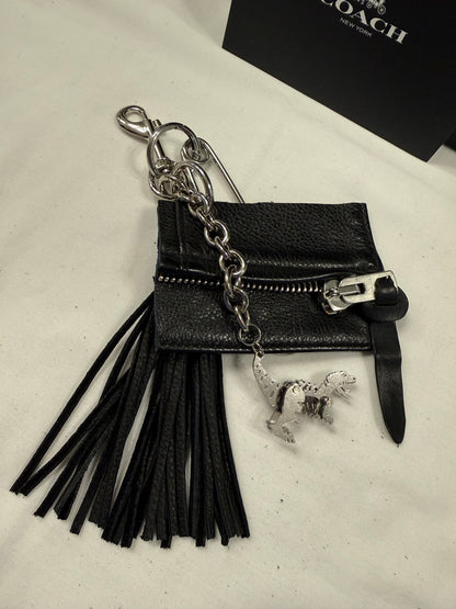 Repurposed Piece of a Coach Motorcycle Jacket, XL Safety Pin, Metal T-Rex, and Leather Tassel Bag Charm Cluster