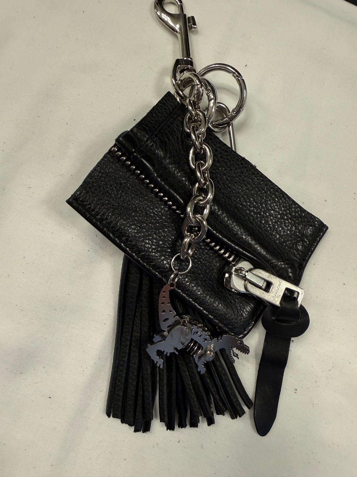 Repurposed Piece of a Coach Motorcycle Jacket, XL Safety Pin, Metal T-Rex, and Leather Tassel Bag Charm Cluster