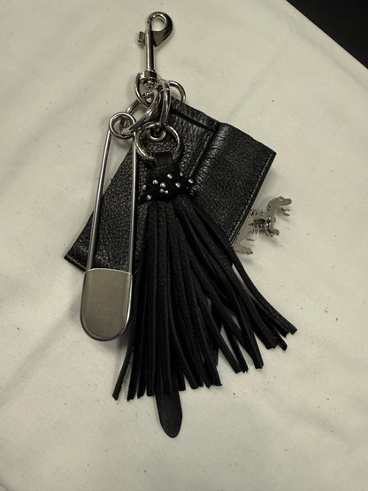 Repurposed Piece of a Coach Motorcycle Jacket, XL Safety Pin, Metal T-Rex, and Leather Tassel Bag Charm Cluster