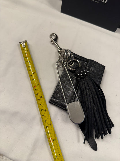 Repurposed Piece of a Coach Motorcycle Jacket, XL Safety Pin, Metal T-Rex, and Leather Tassel Bag Charm Cluster