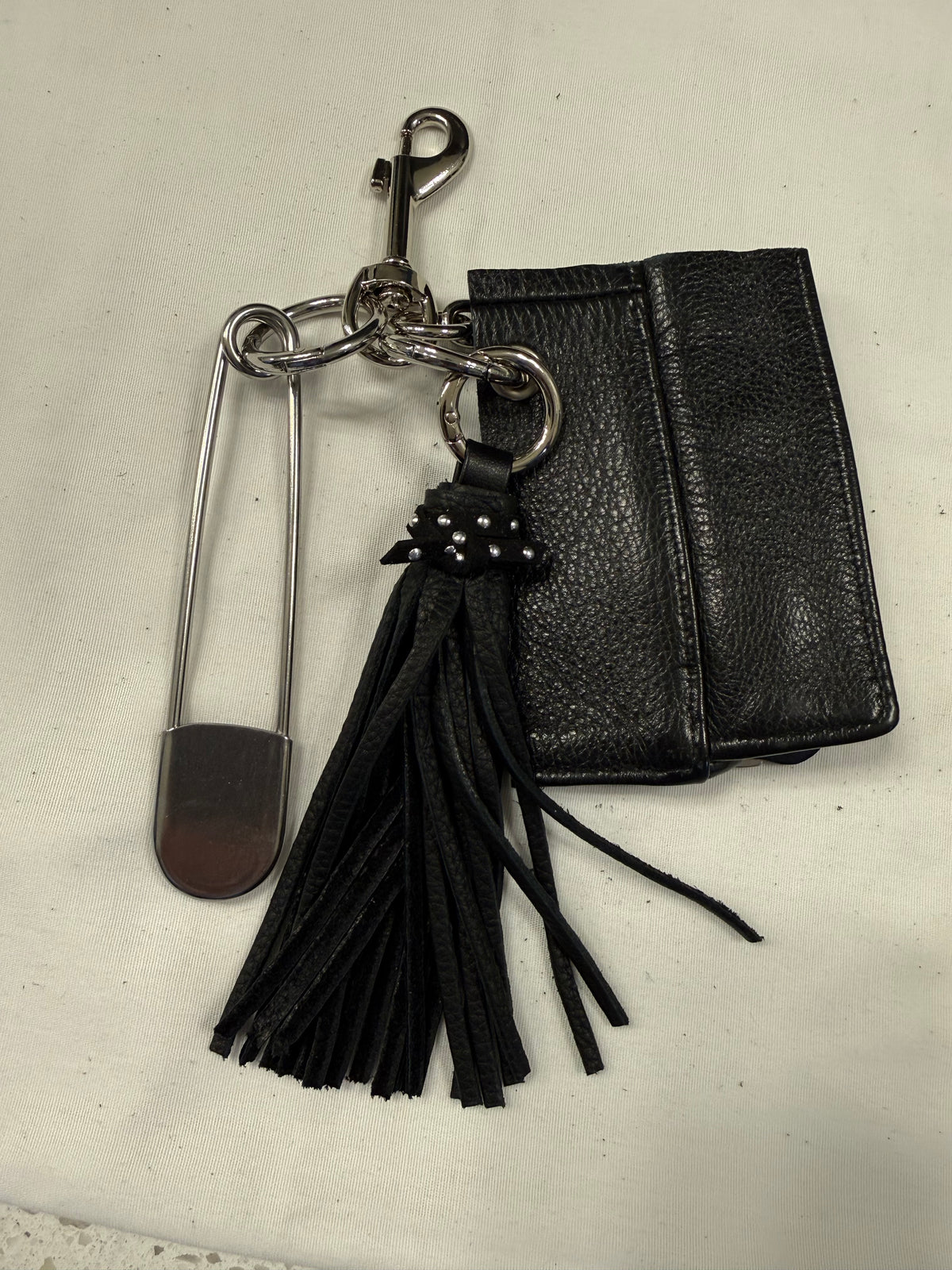 Repurposed Piece of a Coach Motorcycle Jacket, XL Safety Pin, Metal T-Rex, and Leather Tassel Bag Charm Cluster