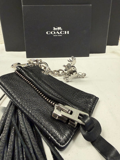 Repurposed Piece of a Coach Motorcycle Jacket, XL Safety Pin, Metal T-Rex, and Leather Tassel Bag Charm Cluster