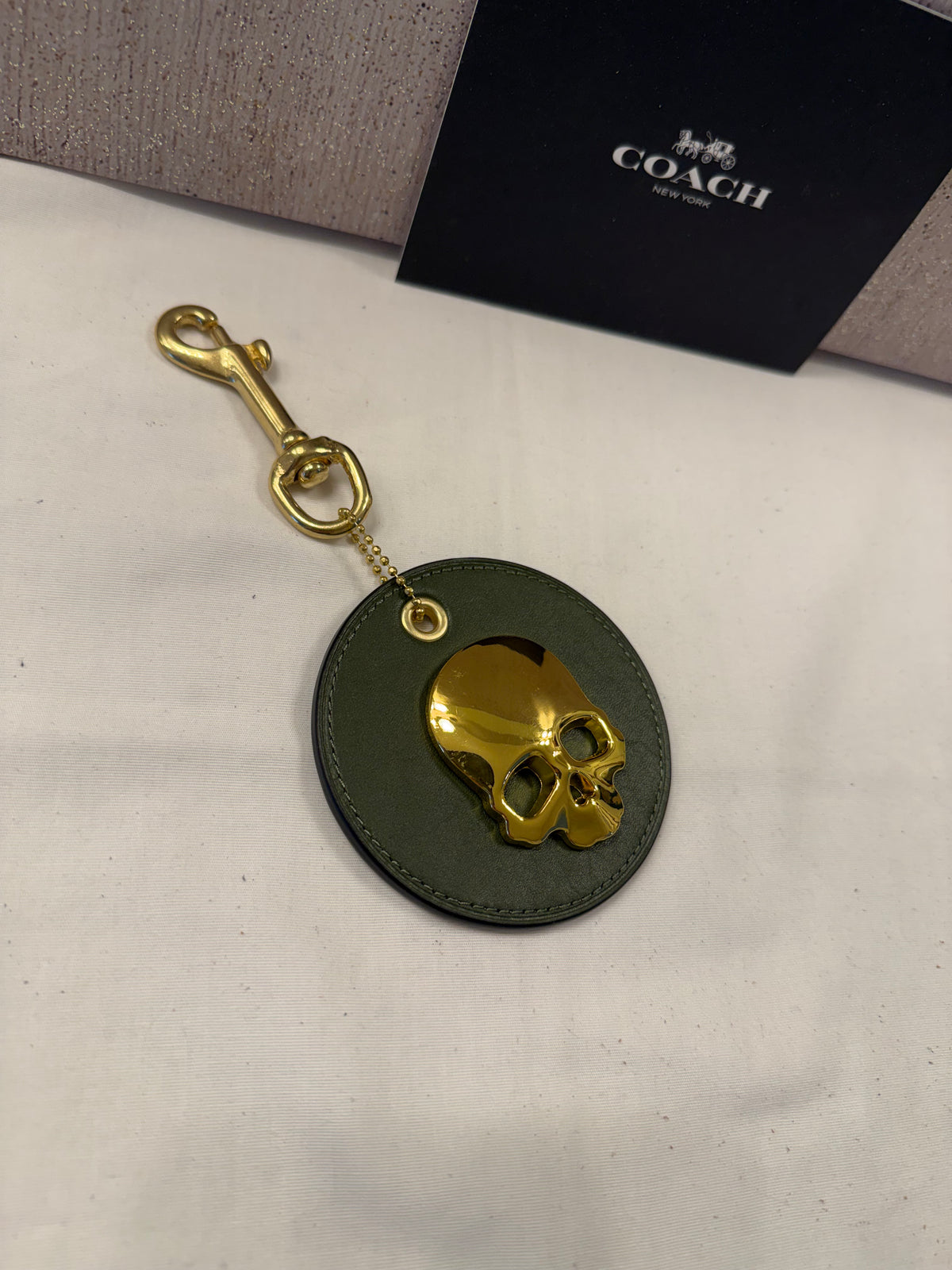 Repurposed Coach Coaster in Olive with Gold Metal Skull and Real Brass Dog Leash Clasp Bag Charm