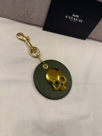 Repurposed Coach Coaster in Olive with Gold Metal Skull and Real Brass Dog Leash Clasp Bag Charm