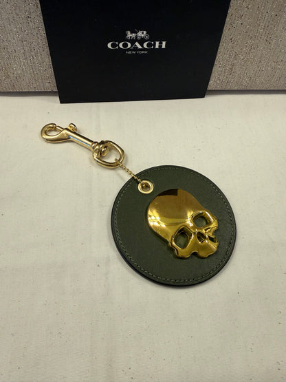 Repurposed Coach Coaster in Olive with Gold Metal Skull and Real Brass Dog Leash Clasp Bag Charm