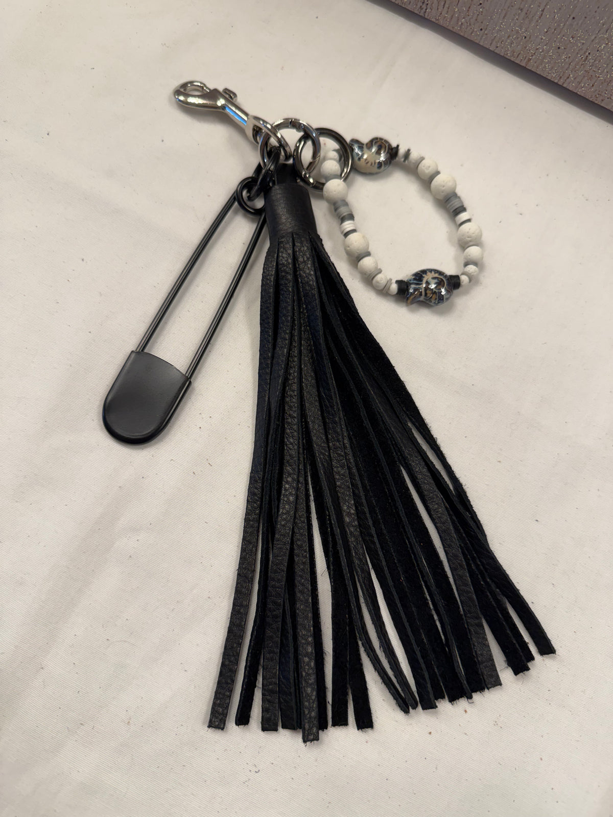 Bag Charm Cluster with Pebbled Leather Tassel, XL Safety Pin, and Beaded Bracelet