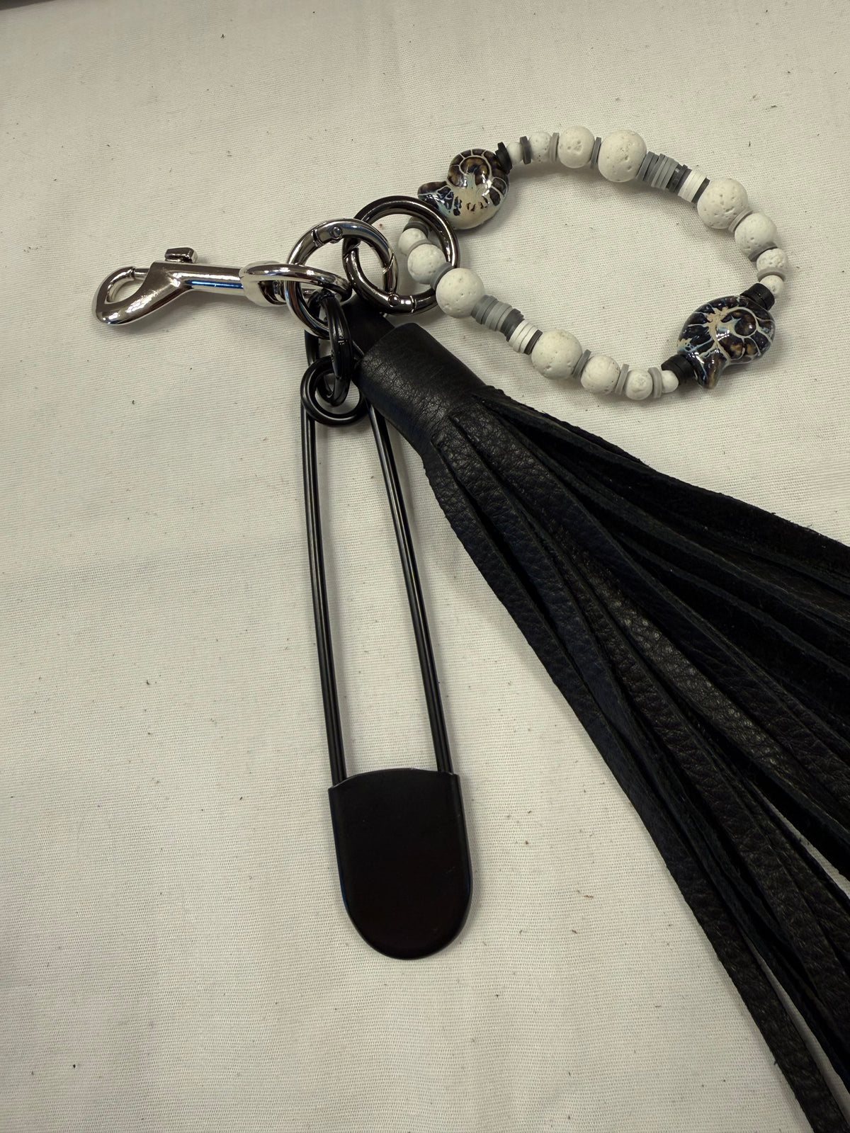 Bag Charm Cluster with Pebbled Leather Tassel, XL Safety Pin, and Beaded Bracelet