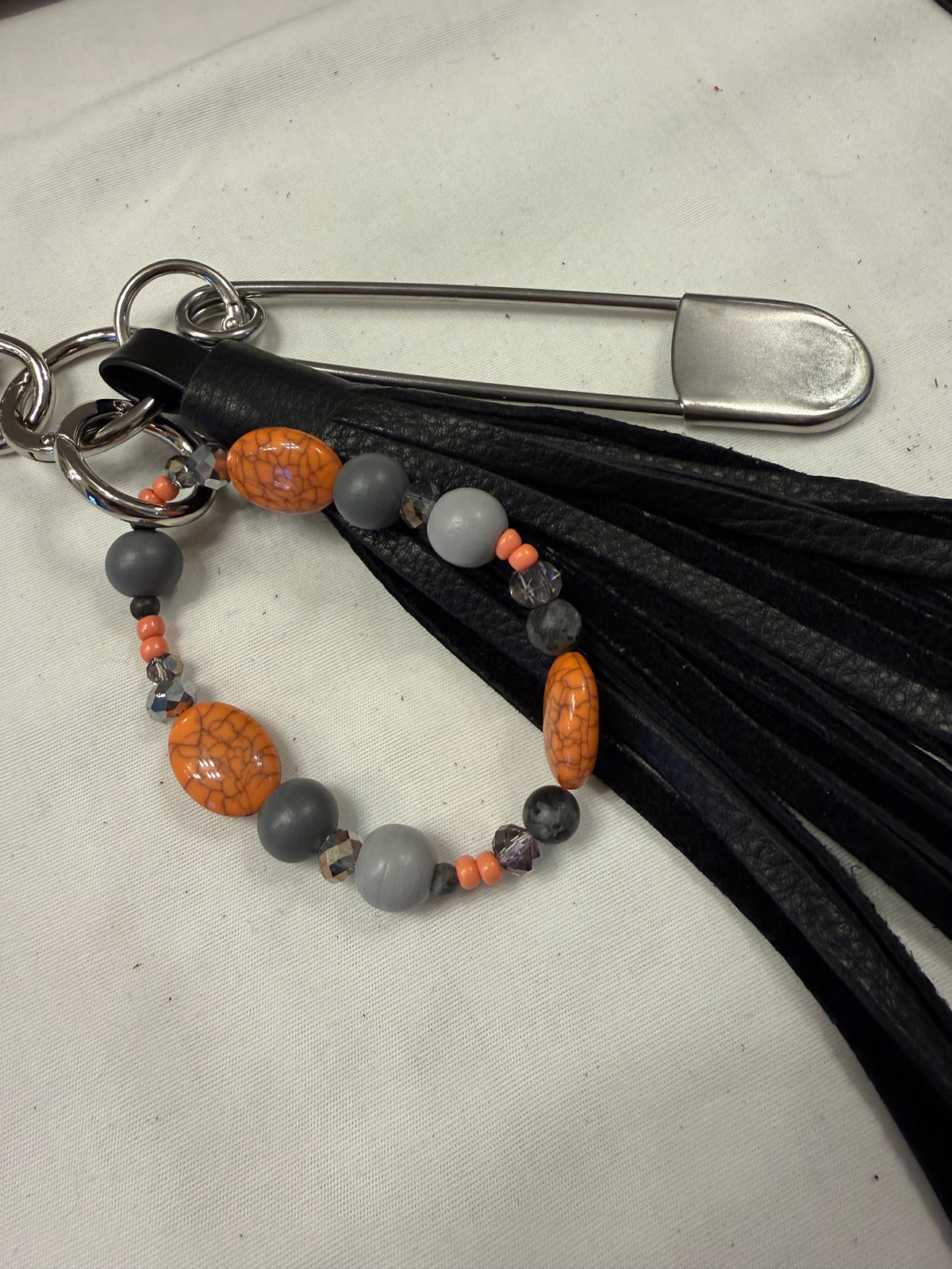 Bag Charm Cluster with Handmade Pebbled Leather Tassel, XL Safety Pin, and Beaded Bracelet