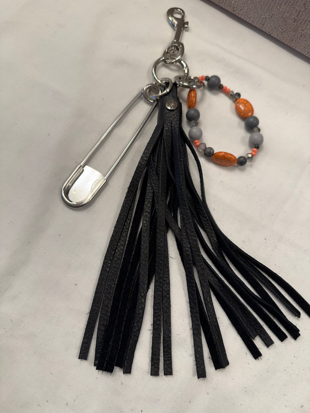 Bag Charm Cluster with Handmade Pebbled Leather Tassel, XL Safety Pin, and Beaded Bracelet