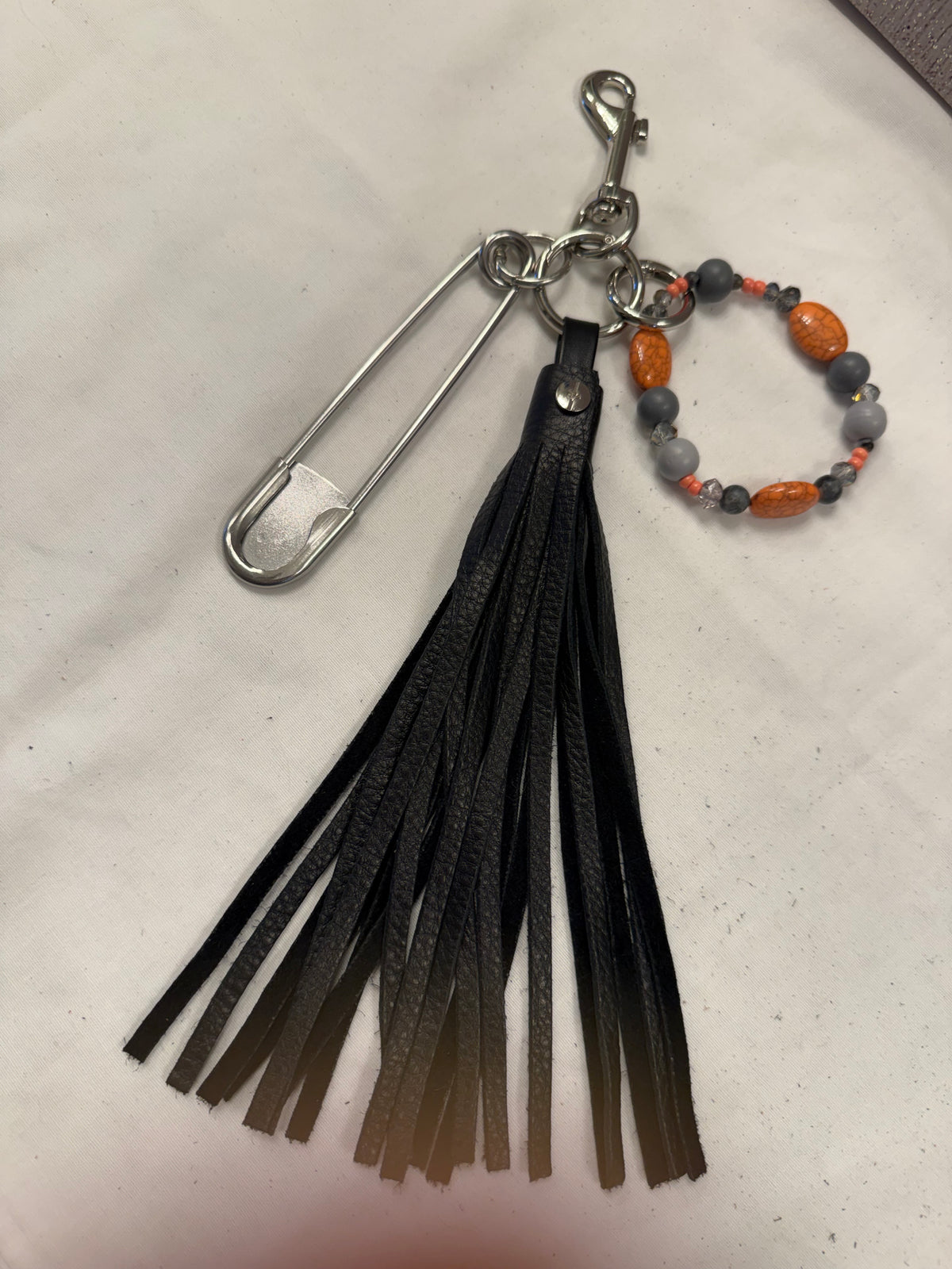 Bag Charm Cluster with Handmade Pebbled Leather Tassel, XL Safety Pin, and Beaded Bracelet