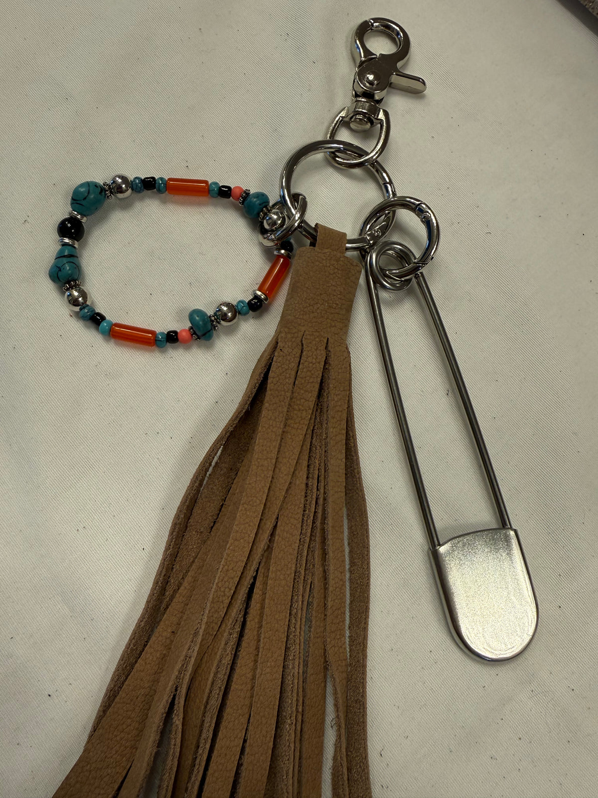 Bag Charm Cluster with Pebbled Leather Sandstone Tassel, Beaded Bracelet, and XL Safety Pin