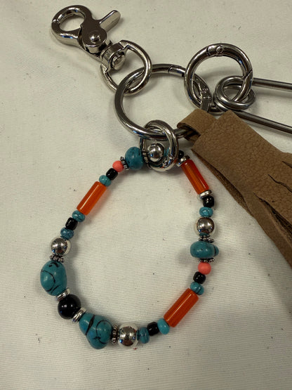 Bag Charm Cluster with Pebbled Leather Sandstone Tassel, Beaded Bracelet, and XL Safety Pin