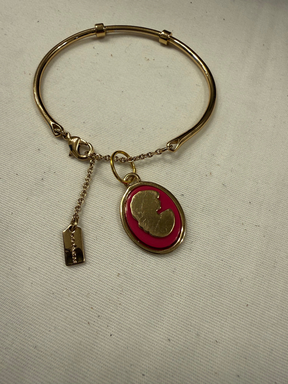 Repurposed Coach Gold Tone Charm Bracelet with Coach Pink and Gold Tone Cameo Charm