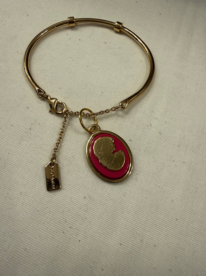 Repurposed Coach Gold Tone Charm Bracelet with Coach Pink and Gold Tone Cameo Charm