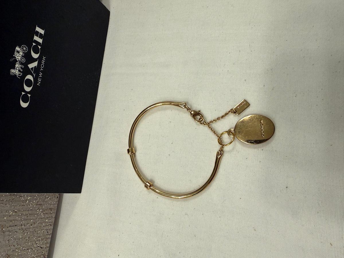 Repurposed Coach Gold Tone Charm Bracelet with Coach Pink and Gold Tone Cameo Charm