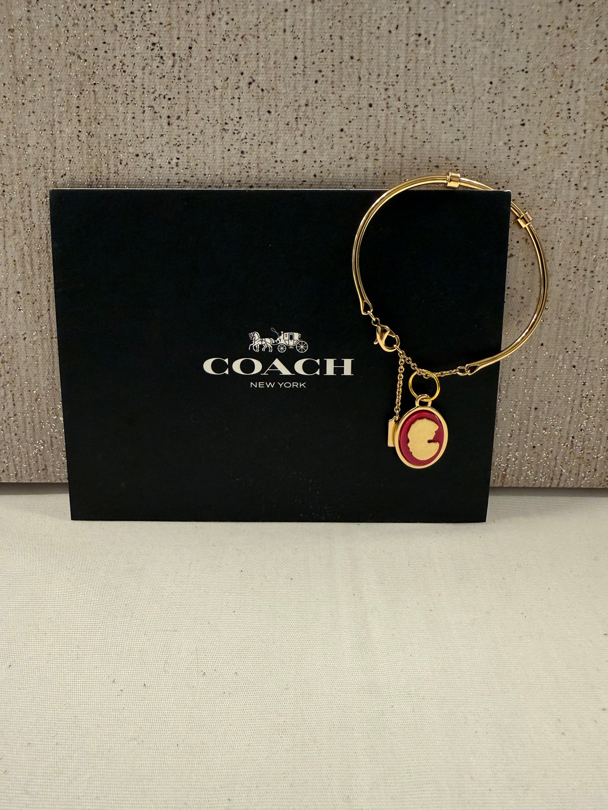 Repurposed Coach Gold Tone Charm Bracelet with Coach Pink and Gold Tone Cameo Charm