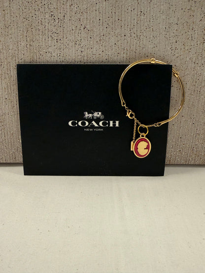 Repurposed Coach Gold Tone Charm Bracelet with Coach Pink and Gold Tone Cameo Charm