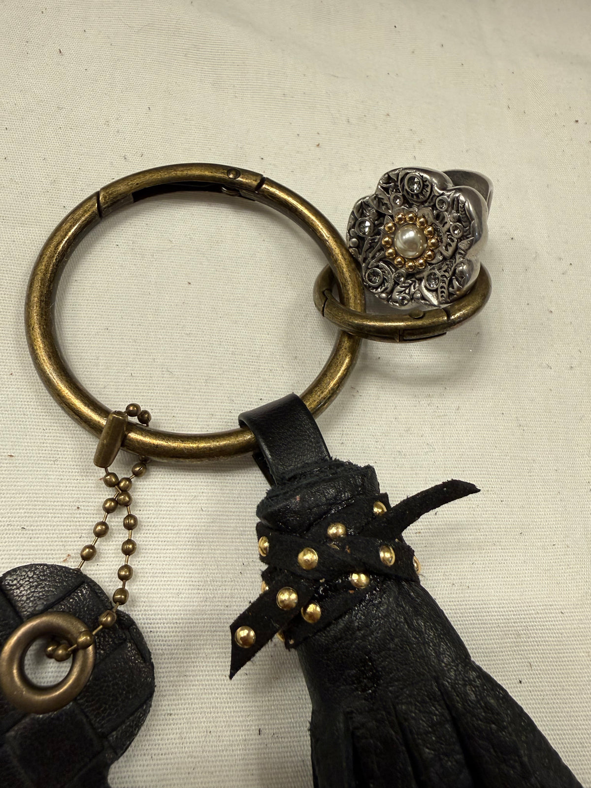 Repurposed Bottega Venetta Wallet Piece, Coach Tea Rose Ring, and Handmade Pebbled Leather Tassel