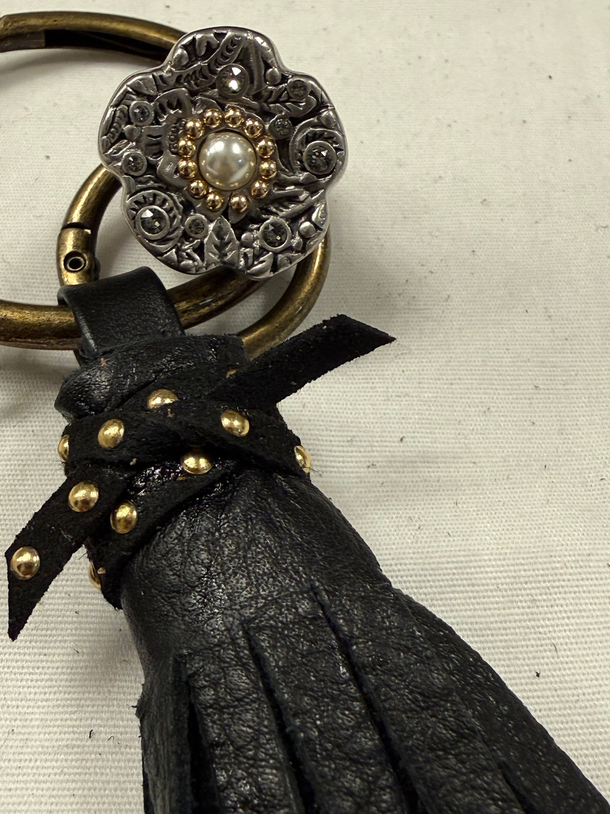 Repurposed Bottega Venetta Wallet Piece, Coach Tea Rose Ring, and Handmade Pebbled Leather Tassel
