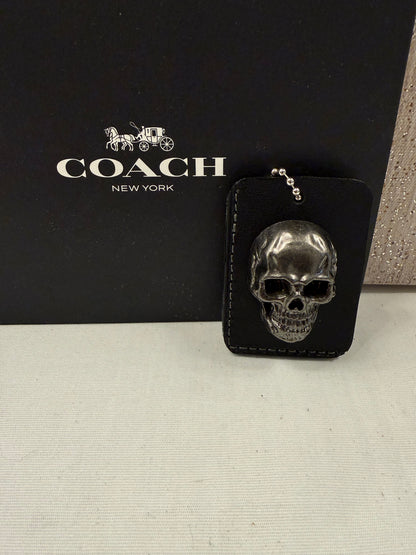Repurposed Piece of a Coach Tic Tac Toe Board with Gunmetal Skull Rivet Bag Charm