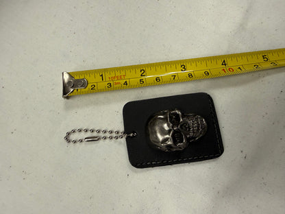 Repurposed Piece of a Coach Tic Tac Toe Board with Gunmetal Skull Rivet Bag Charm