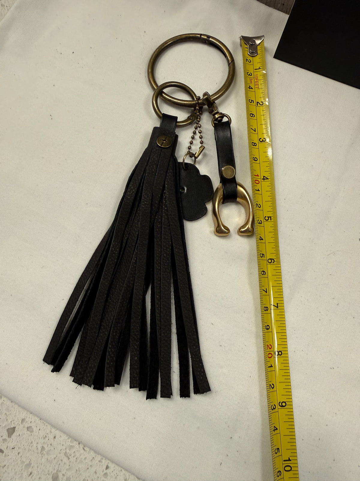 Ships 10.13.26 Bag Charm Cluster with a Repurposed Coach C from Tic Tac Toe Board, Coach Tea Rose, and Handmade Leather Tassel Bag Charm Cluster